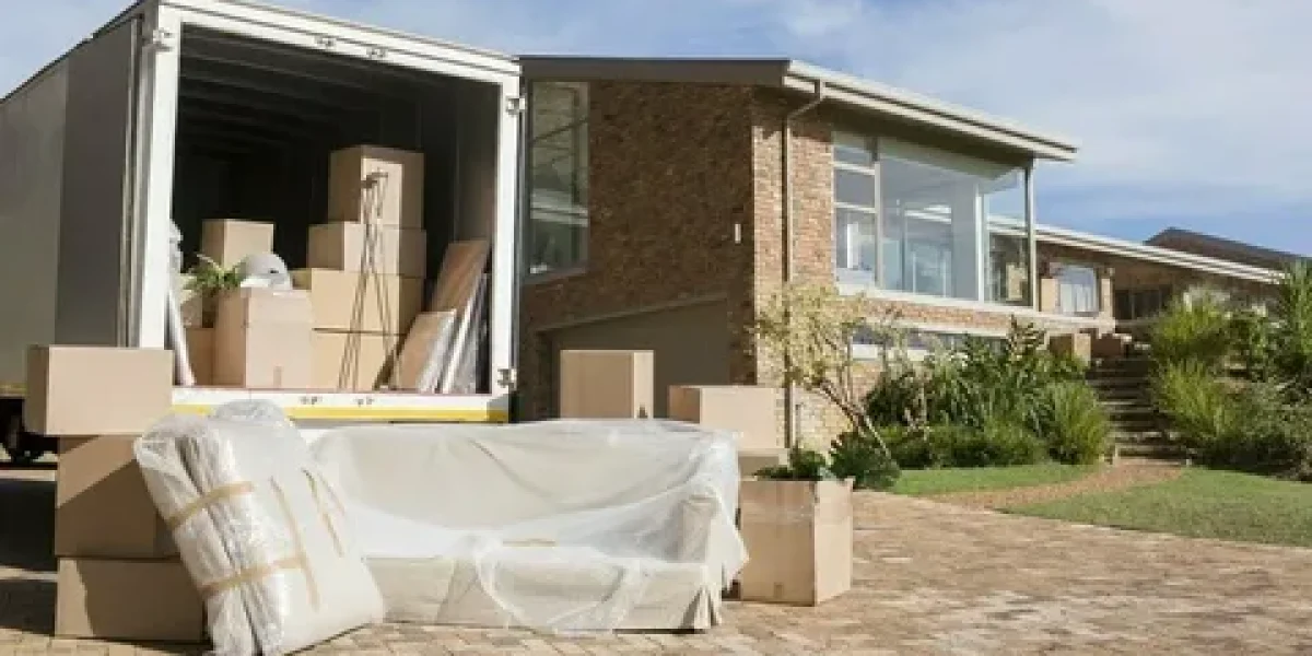 Furniture and boxes outside a home during a move.