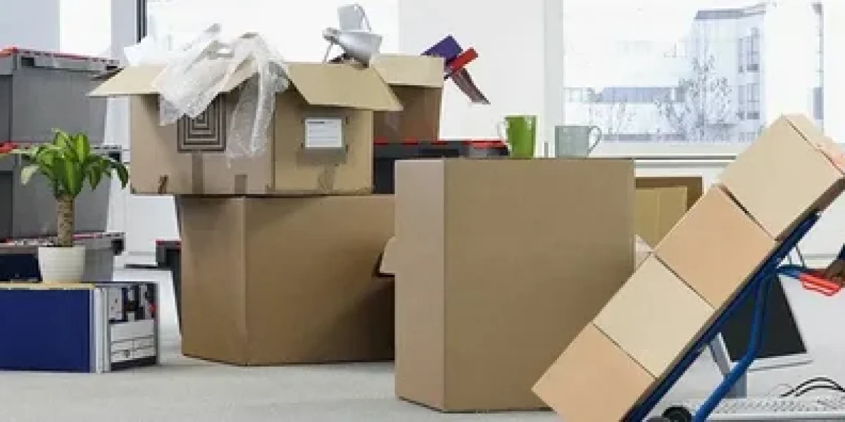 Office relocation with packed boxes and mover.
